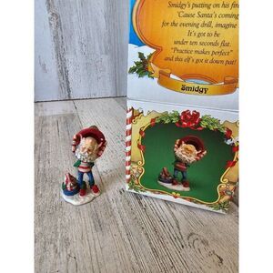 Enesco smudgy firefighter North Pole village Sandi zimnicki rare vintage